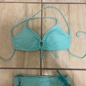 PAPAYA CON LECHE brand bikini from Costa Rica. Aqua, size medium. Barely worn.